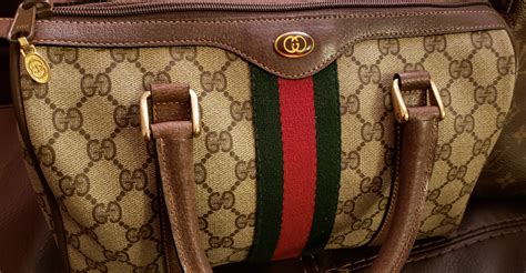 how to tell if a vintage gucci purse is real|first copy gucci bags.